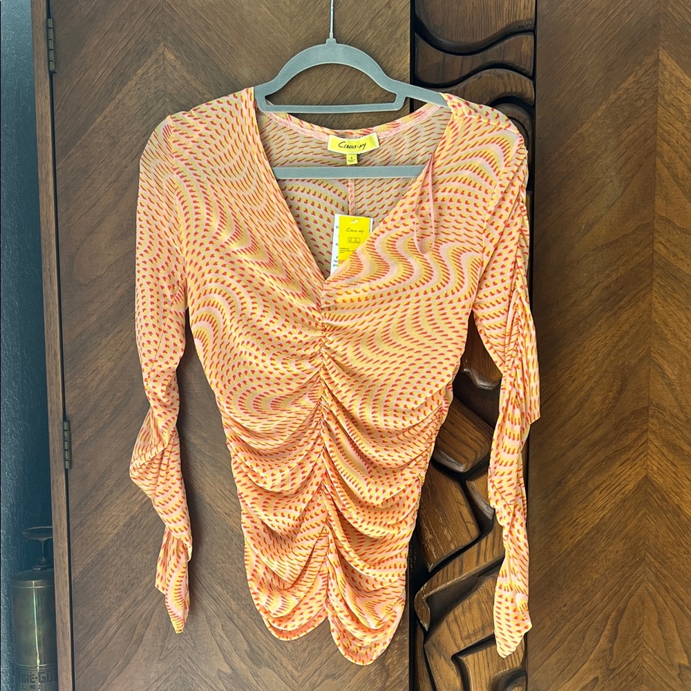 Circus Ny mesh top. Size Small but fits medium easily.